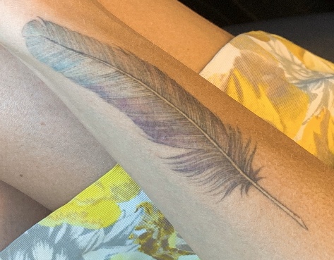 Feather tags tattoo ideas | World Tattoo Gallery